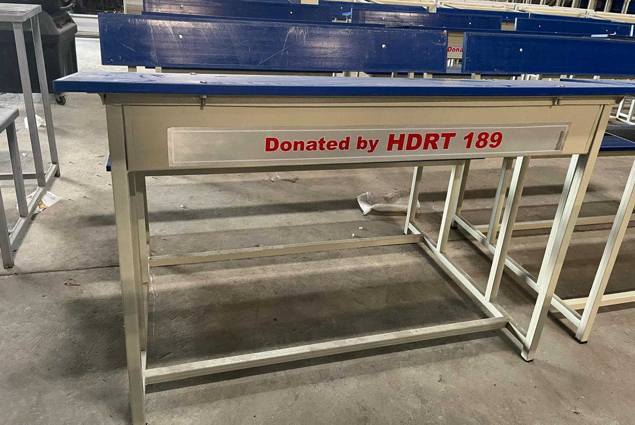A school bench labelled Donated by HDRT 189